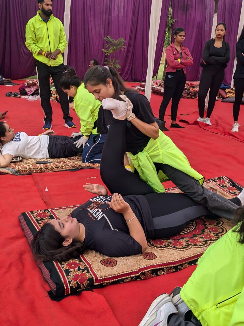 F95 therapist giving health awards and certificates to school students